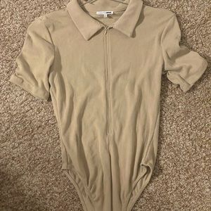 Size large fashion nova bodysuit. Never worn.